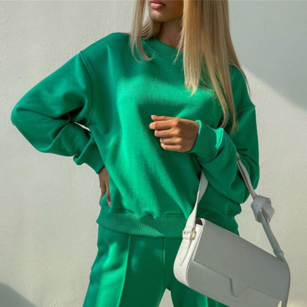 Smaragdgroen joggingpak met sweater met ronde hals, voorkant