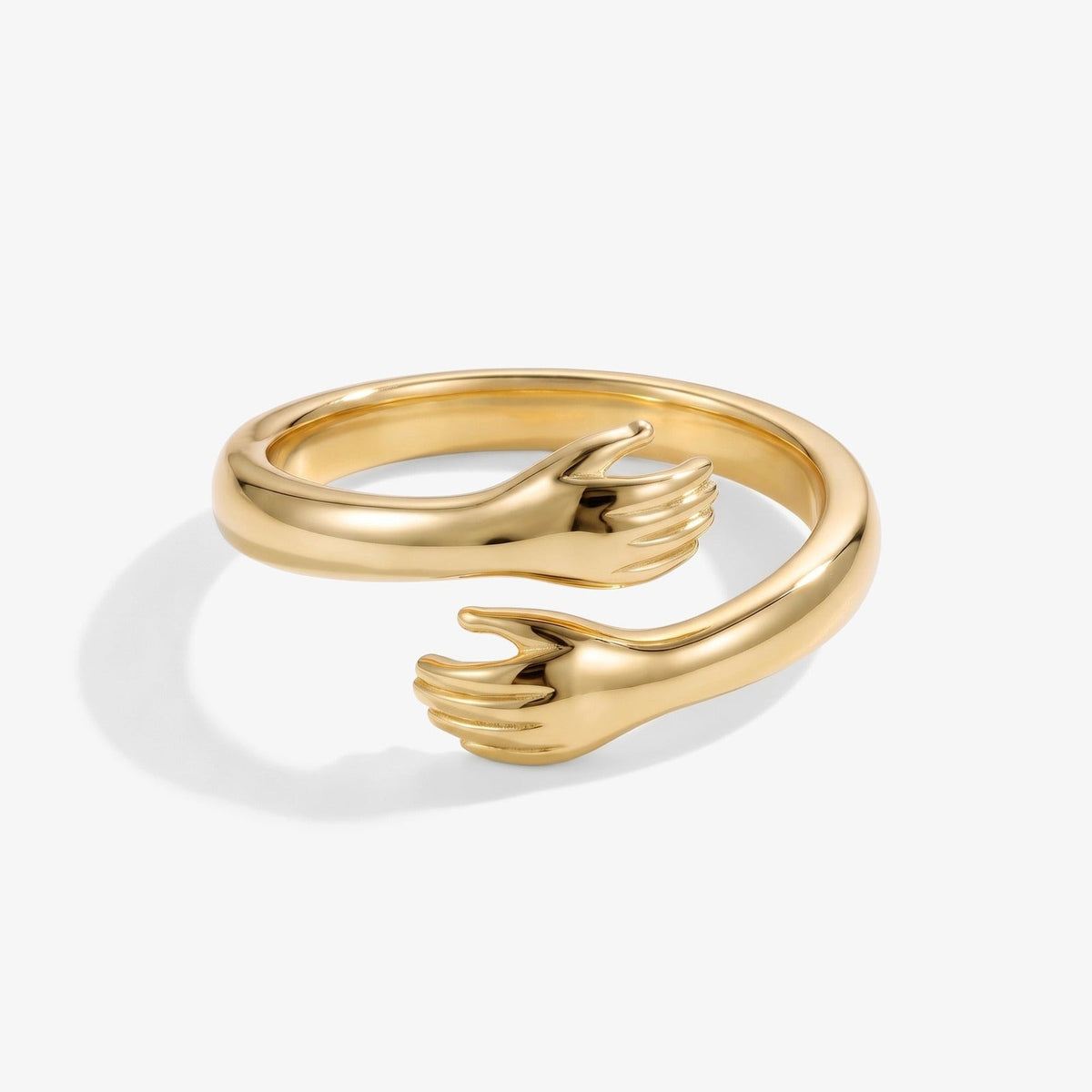 Gouden knuffelring met handjes