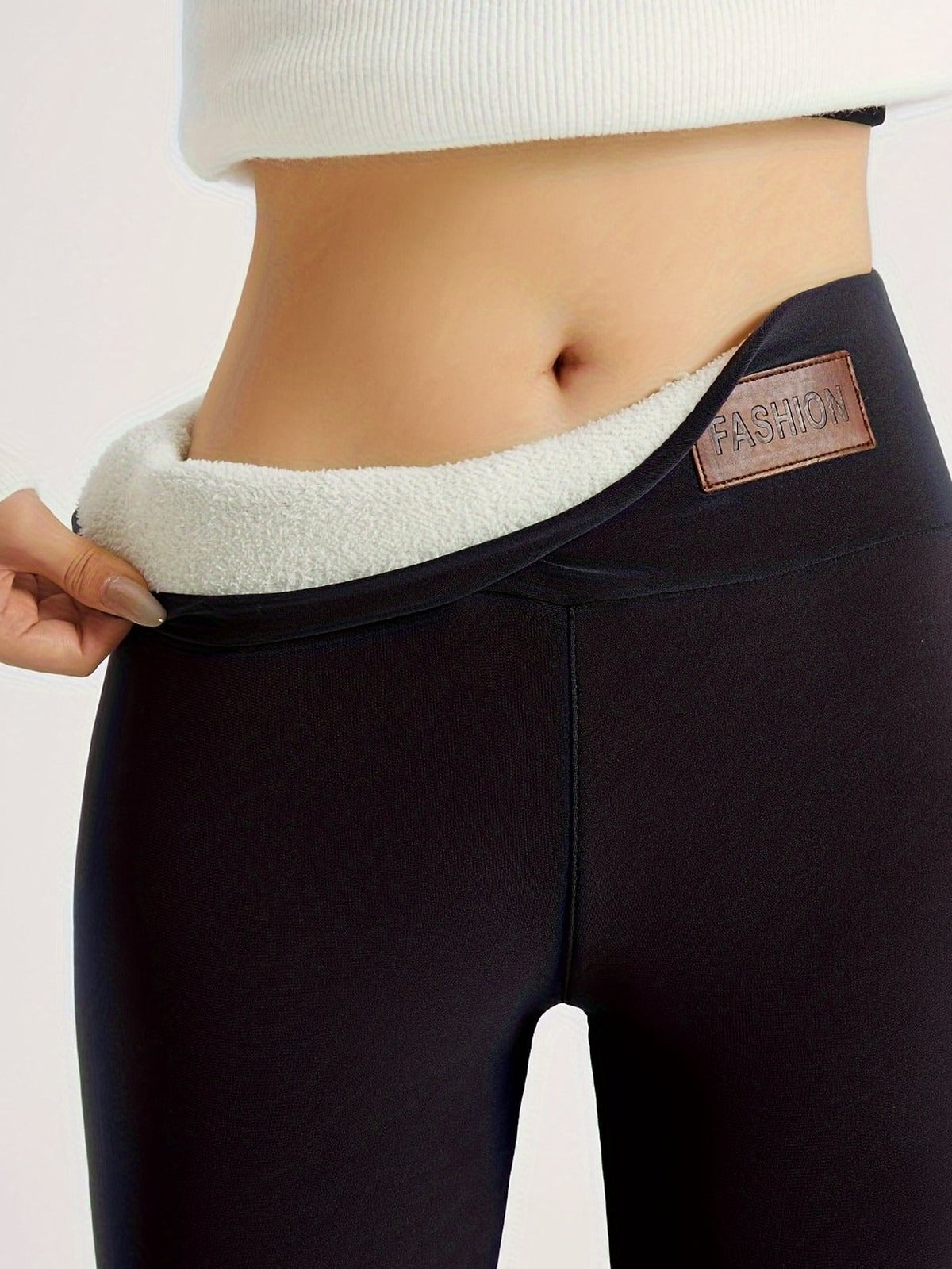 Zwarte thermo legging met omgeslagen fleecevoering