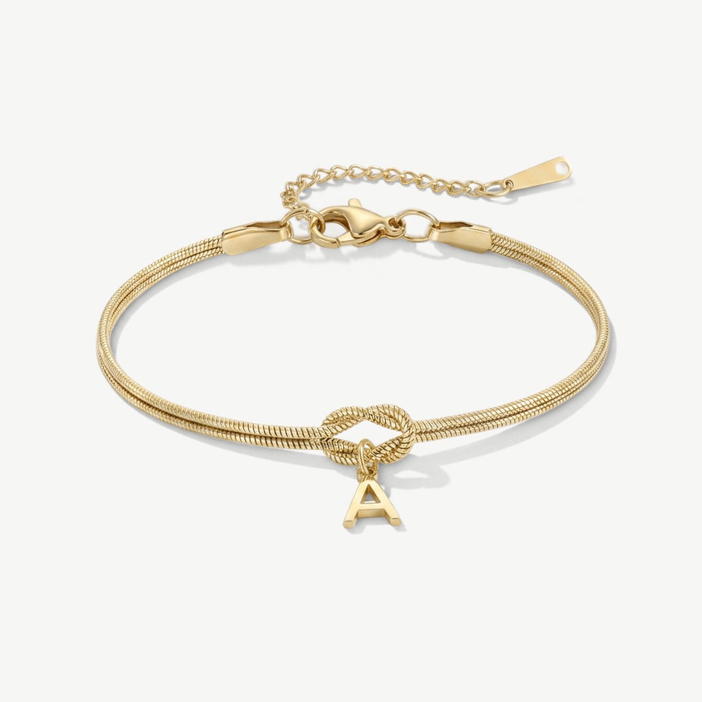 Gouden initiaal armband met knoop en letter A