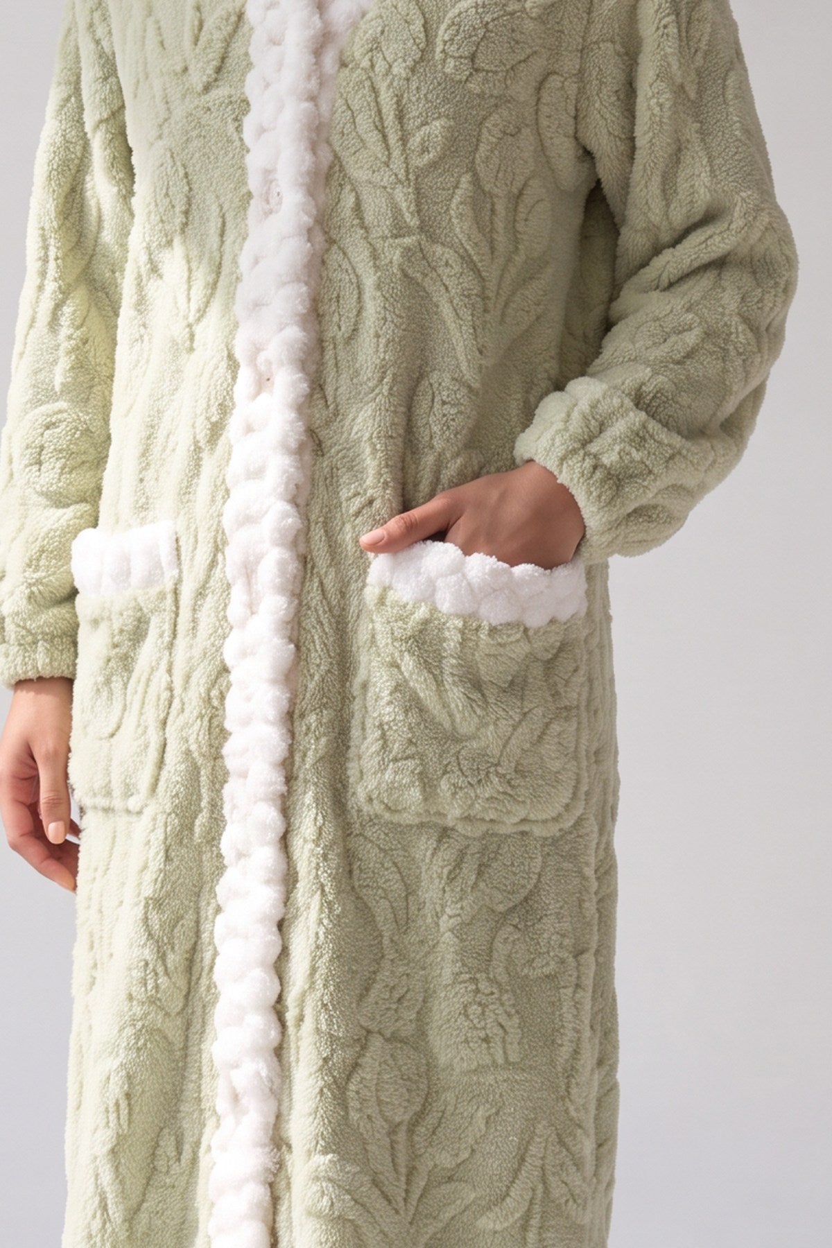Saliegroene pluche fleece met reliëf in tulpenmotief, stofdetail