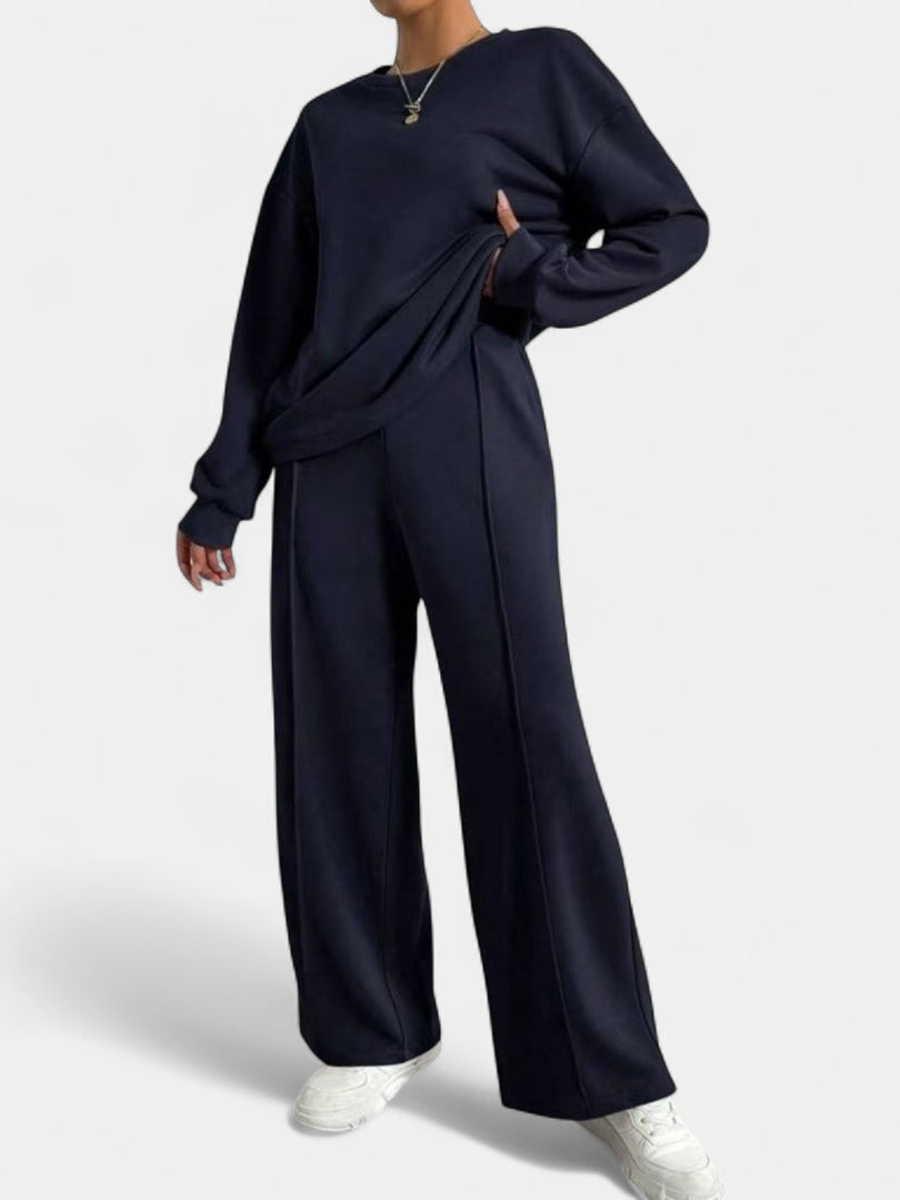 Huispak in marineblauw met sweater met ronde hals en wijde broek met naad, vooraanzicht