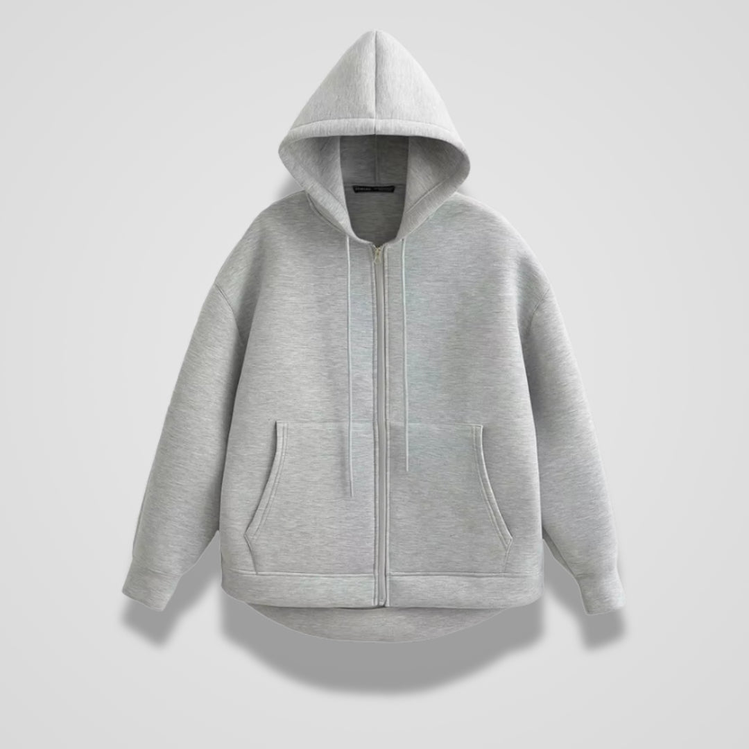 Lichtgrijs oversized vest met capuchon en afgeronde zoom, vooraanzicht | Boutique Moda