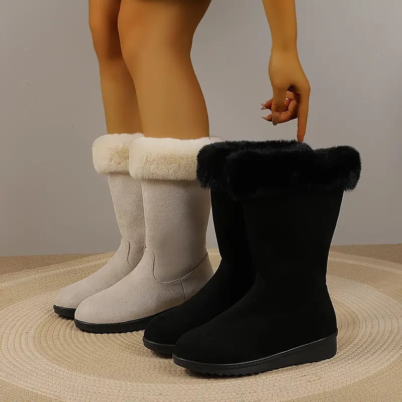 Beige en zwarte gevoerde laarzen met nepbontrand