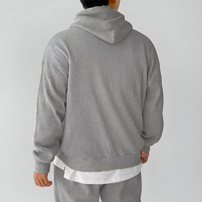 Geribde oversized hoodie voor heren in grijs, gedragen, achterkant