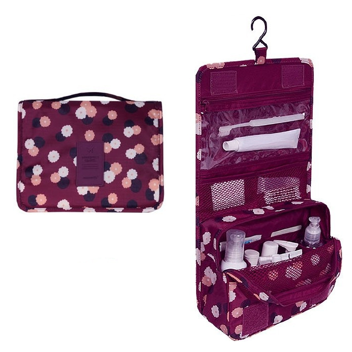 Bordeauxrode toilettas met bloemenprint, opengeklapt met vakken en ophanghaak | Boutique Moda