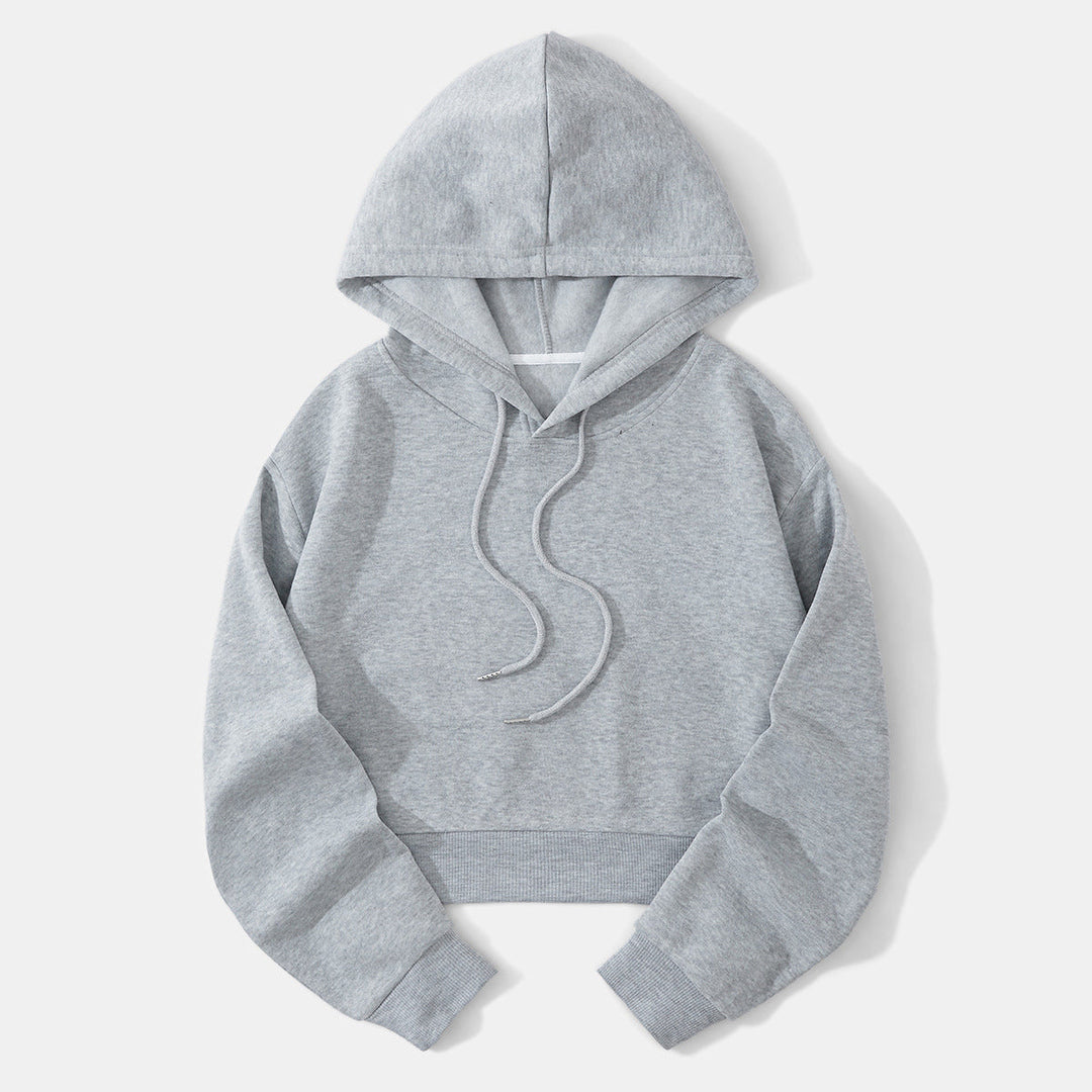 Lichtgrijze cropped hoodie plat neergelegd, met koorden en zoomband | Boutique Moda