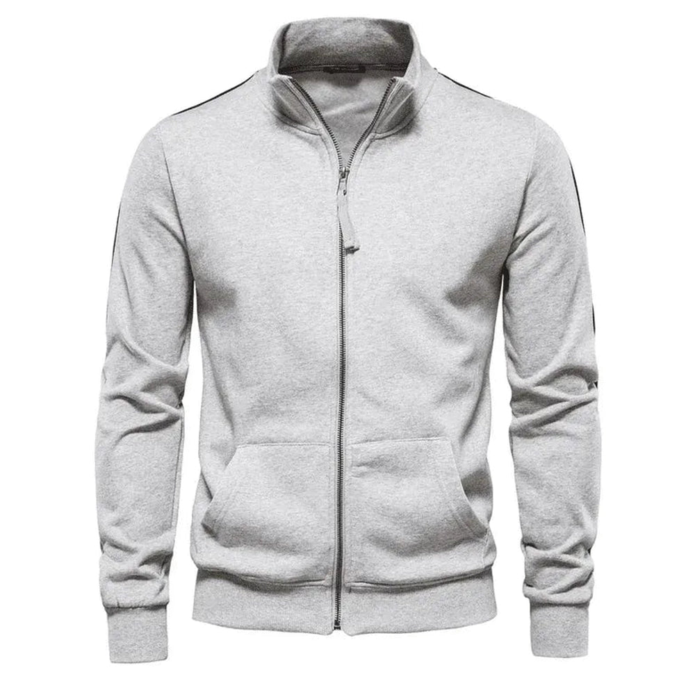 Lichtgrijs sweatvest met donkere mouwstrepen op een witte achtergrond | Boutique Moda
