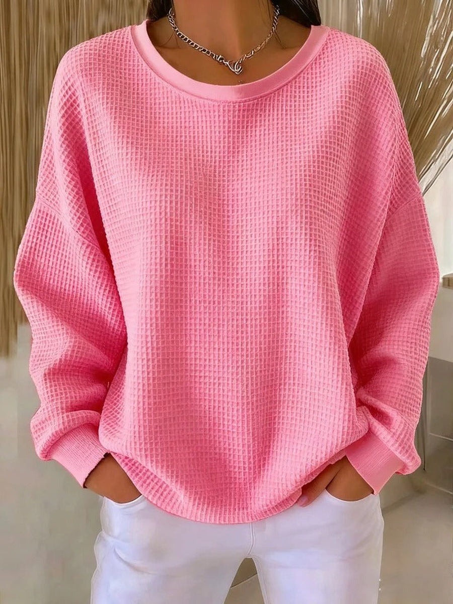 Roze oversized sweater met wafelstructuur, voorkant