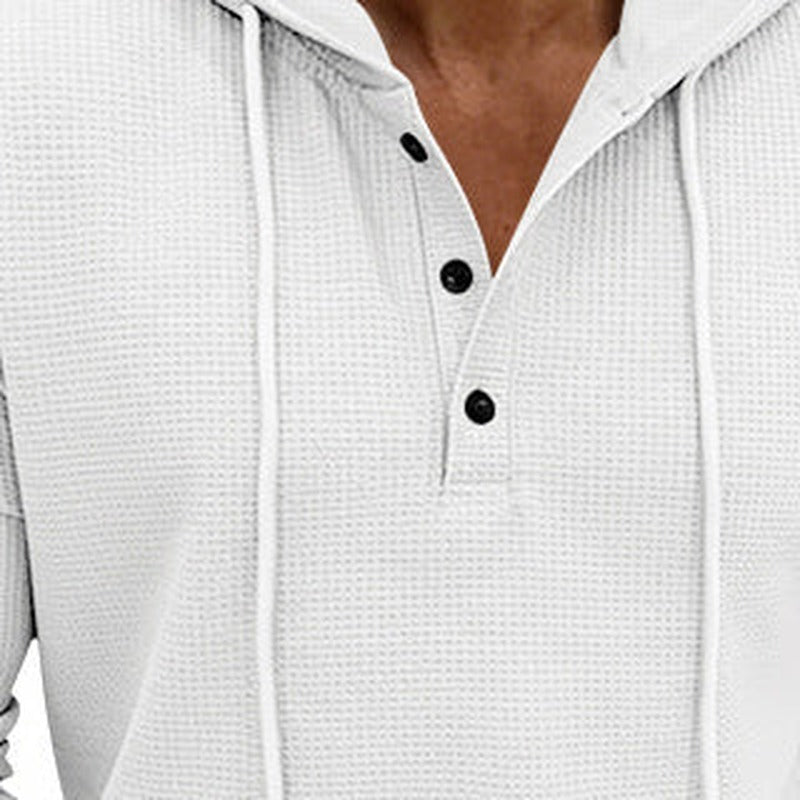 Henleyhoodie met wafelstructuur voor heren in wit, close-up van de knoopsluiting, de koorden en de wafelstructuur