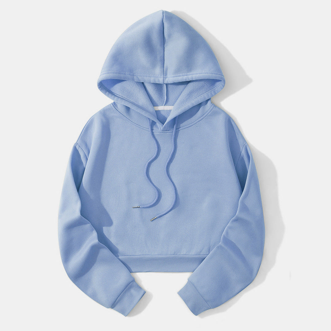 Lichtblauwe cropped hoodie plat neergelegd, met capuchon en koorden | Boutique Moda
