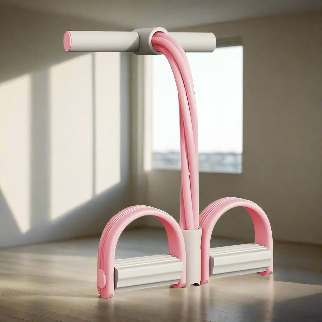 Roze-witte weerstandsband met voetpedalen en schuimen handgreep, vrijstaand getoond | Boutique Moda