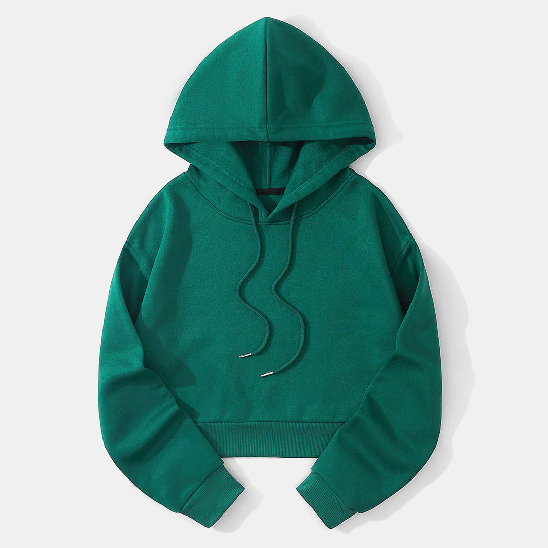 Donkergroene cropped hoodie plat neergelegd, met capuchon en geribde zoomband | Boutique Moda