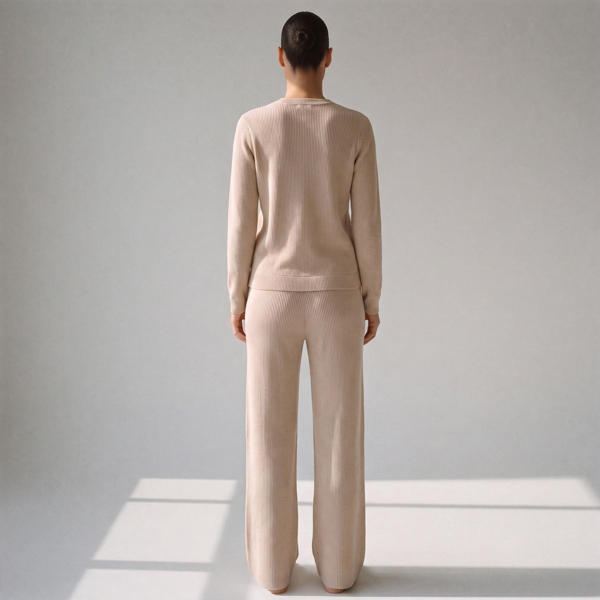 Beige gebreide set, achterkant