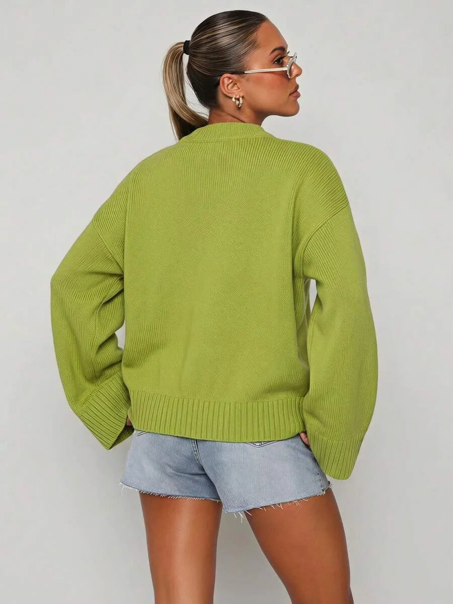 Oversized trui met ronde hals in limoengroen, studiofoto