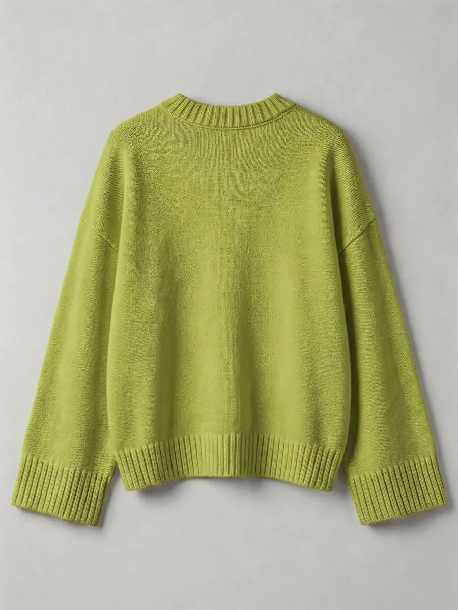 Oversized trui met ronde hals in limoengroen, plat gefotografeerd