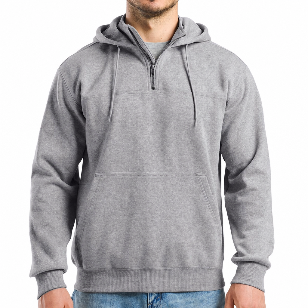 A man wears a grey heather quarter-zip hooded sweatshirt with a front pocket, shown from the front in a studio setting.