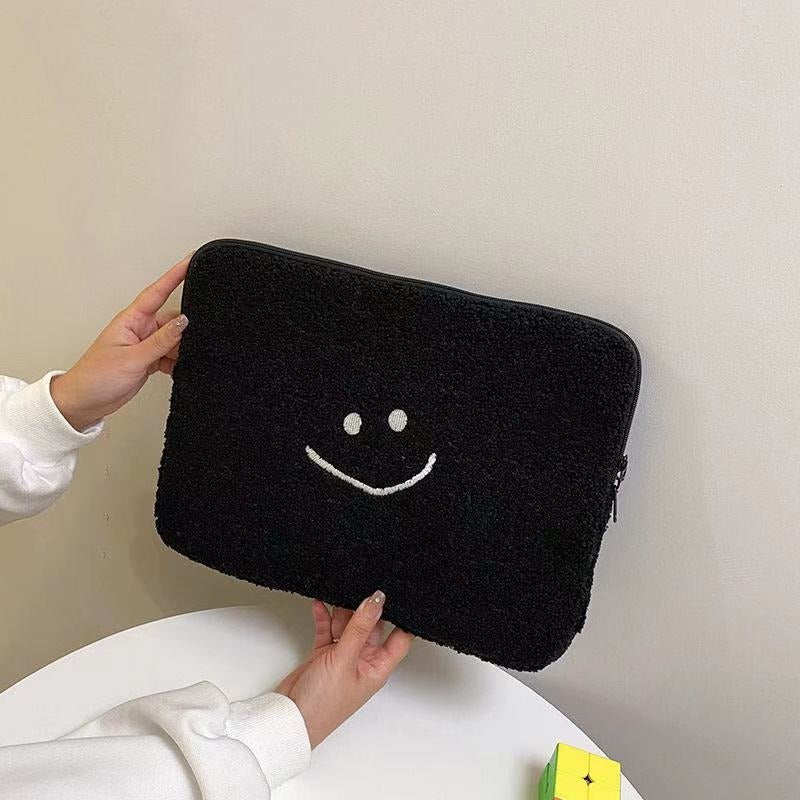 Laptophoes van teddystof met smiley 7
