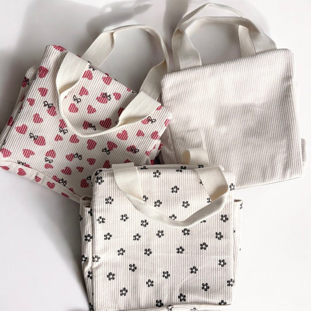 Ribfluwelen lunchtas met print 1