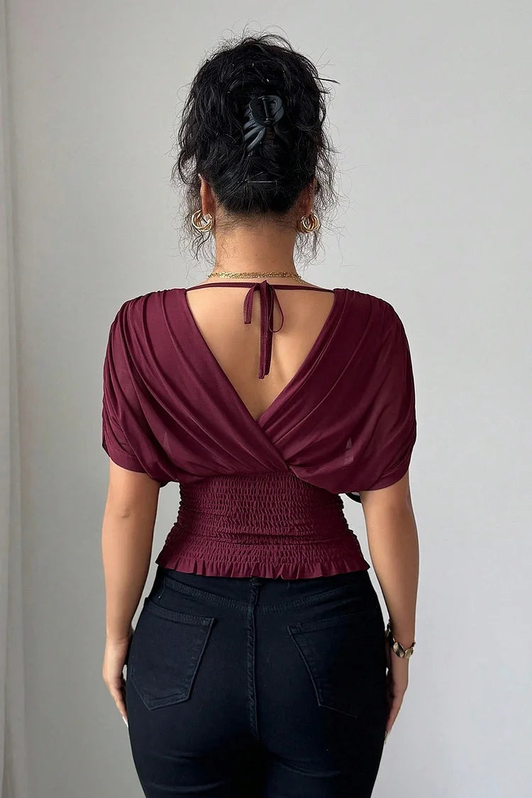 Elegante V-hals top met drape mouwen