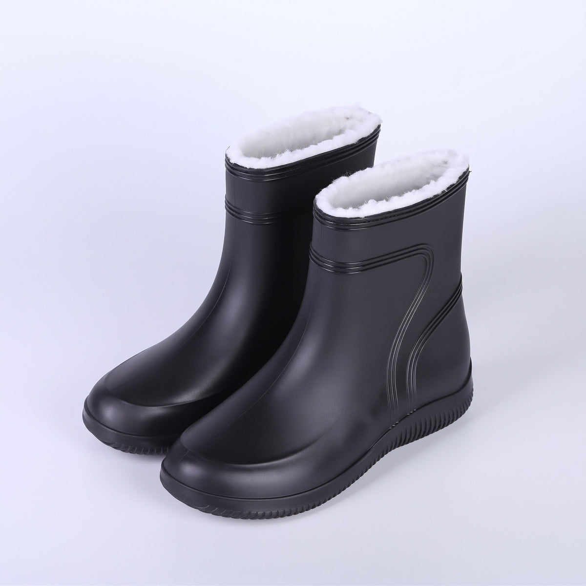 Zwarte korte regenlaarzen met witte pluchevoering, los product zonder mannequin | Boutique Moda