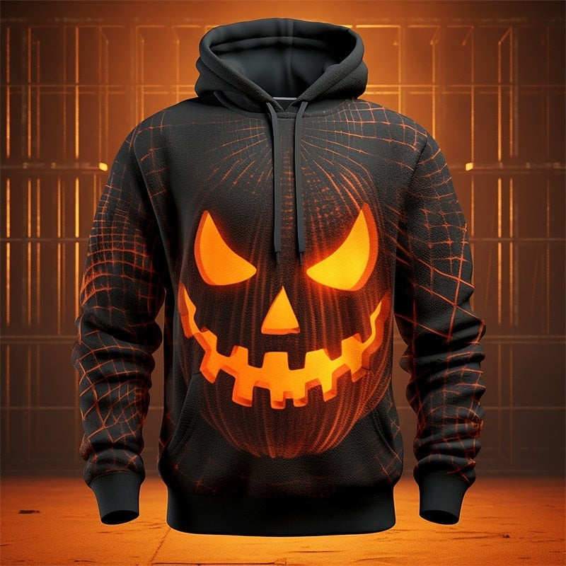 Zwarte hoodie met oranje pompoengezicht print, gedragen door een model | Boutique Moda