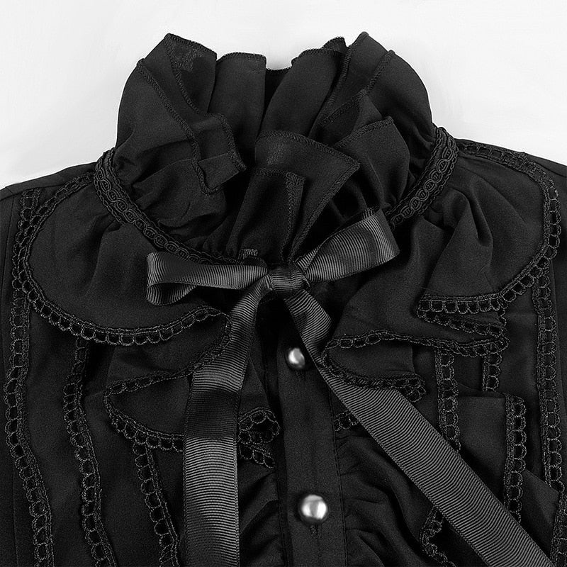 Zwart overhemd met ruchekraag, kant en strik, close-up detail | Boutique Moda