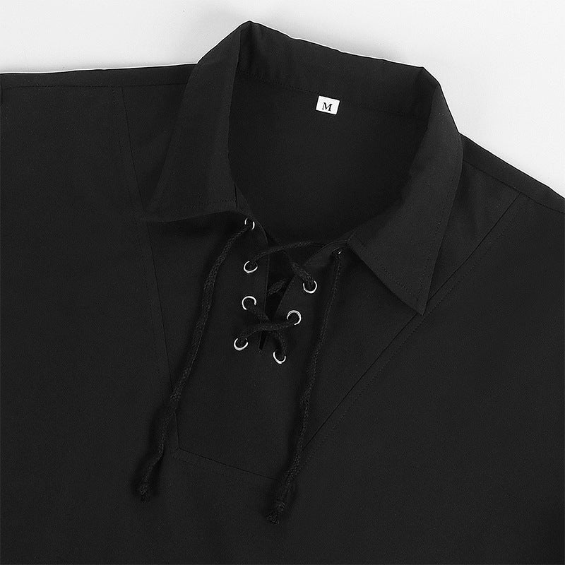 Zwart overhemd met vetersluiting en puntkraag, close-up detailweergave | Boutique Moda