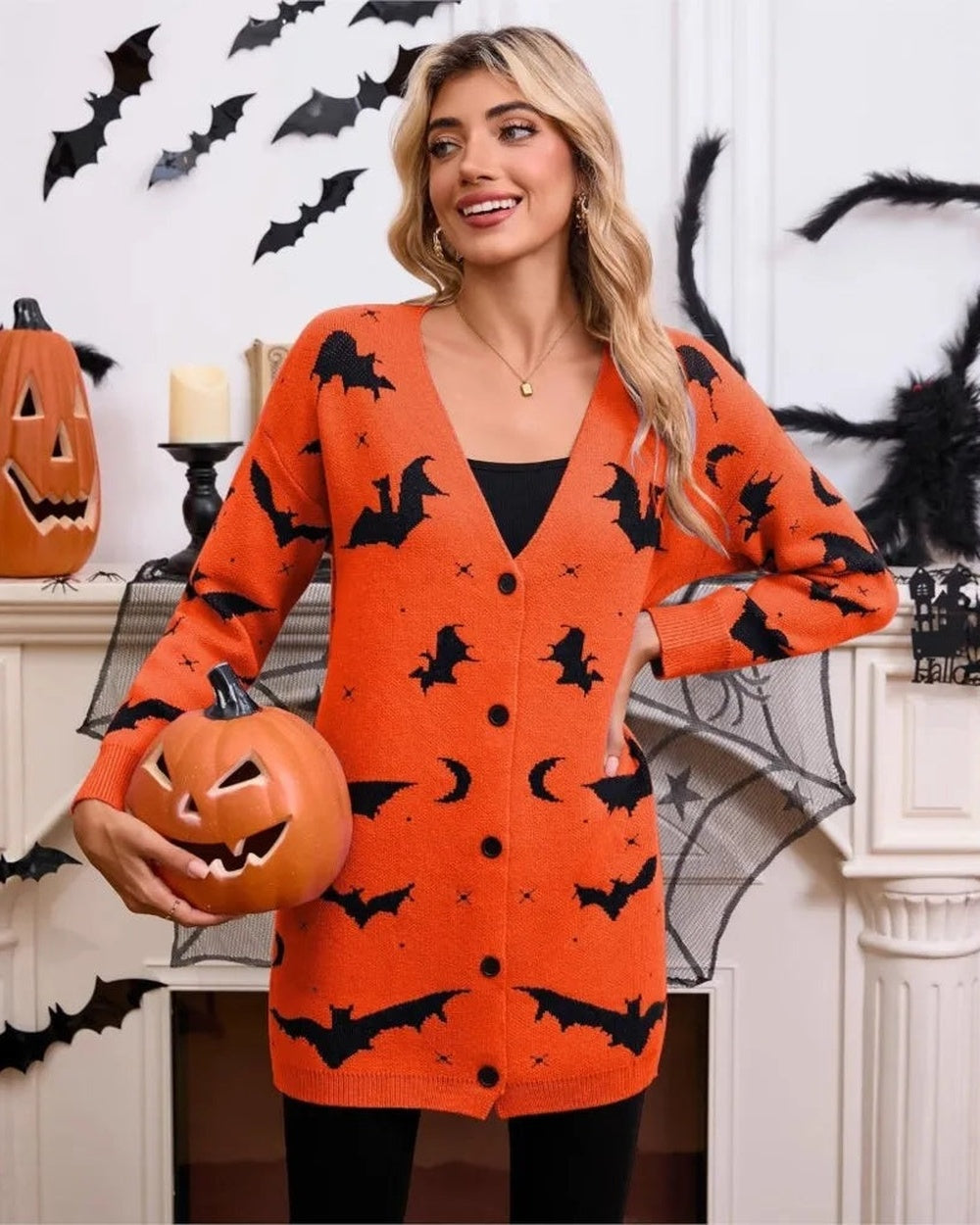 Oranje Halloween vest met een uitgesneden pompoen