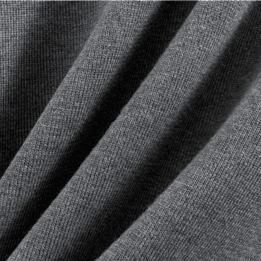 Close-up van het zachte grijze breisel
