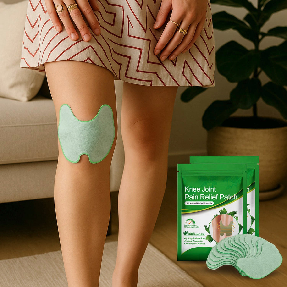 Groene kruidenpleister op knie, verpakking en losse pleisters ernaast getoond | Boutique Moda