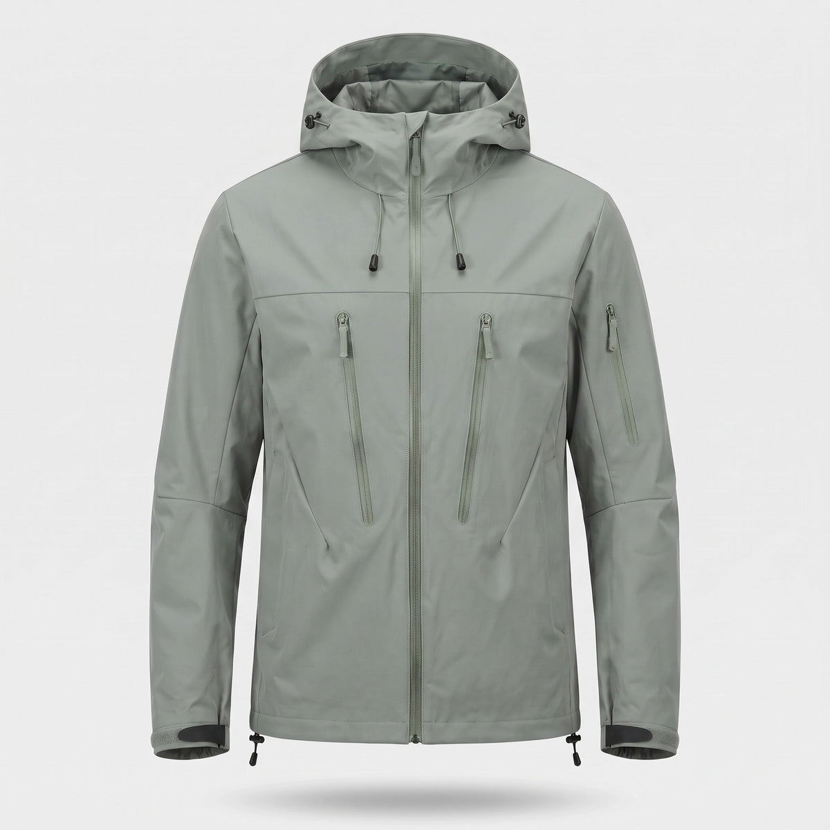 Grijze technische regenjas met capuchon en meerdere ritszakken op paspop | Boutique Moda