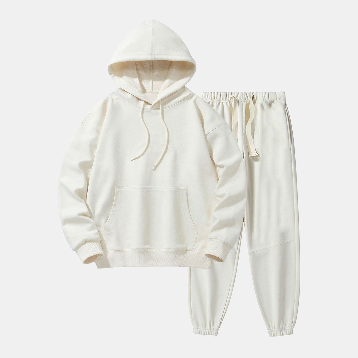 Crème kleurige hoodie met joggingbroek, los model, liggend uitgestald | Boutique Moda