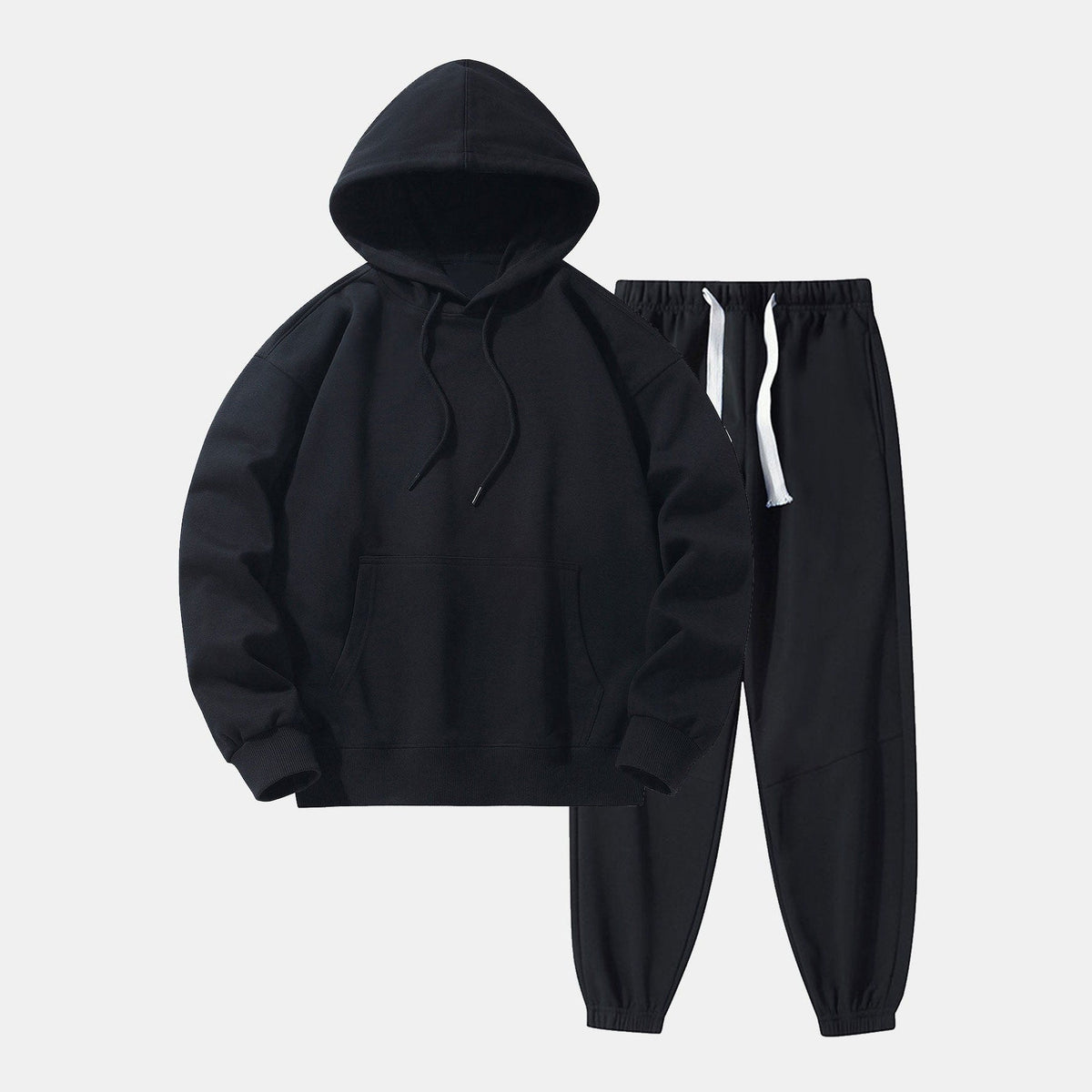 Zwarte hoodie met joggingbroek, effen kleur, plat gefotografeerd zonder model | Boutique Moda