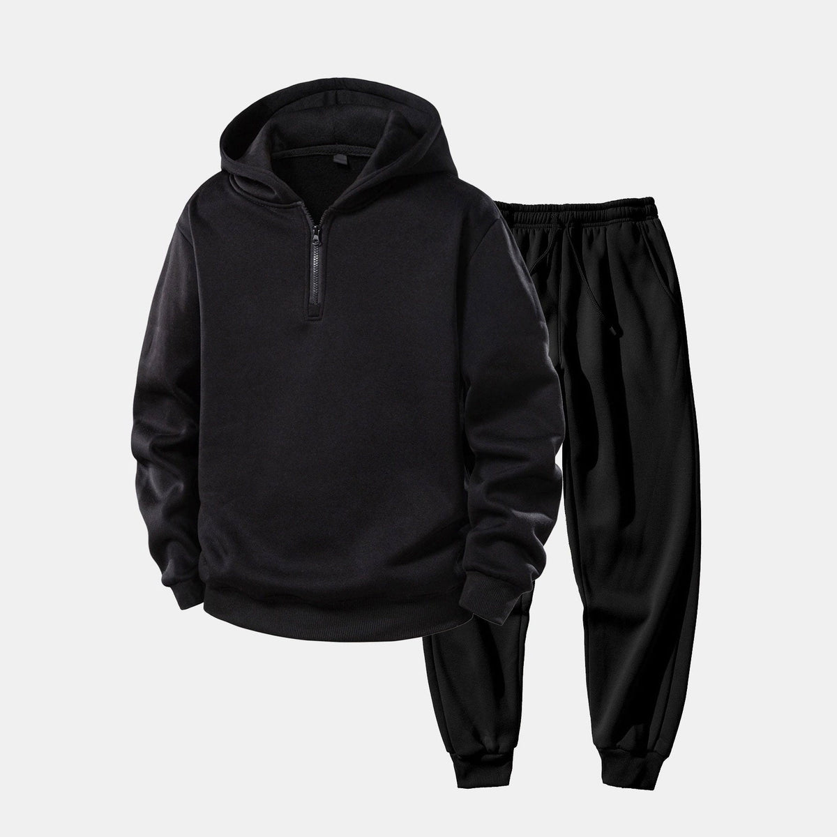 Zwarte trainingspak met halfzip hoodie en joggingbroek, plat gefotografeerd | Boutique Moda