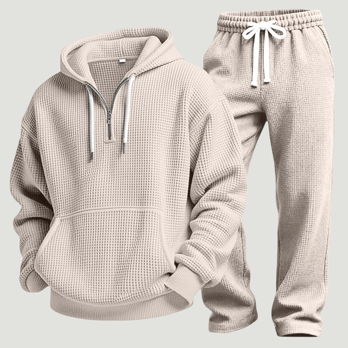 Beige wafelstof trainingspak met hoodie en halve rits, plat uitgestald | Boutique Moda
