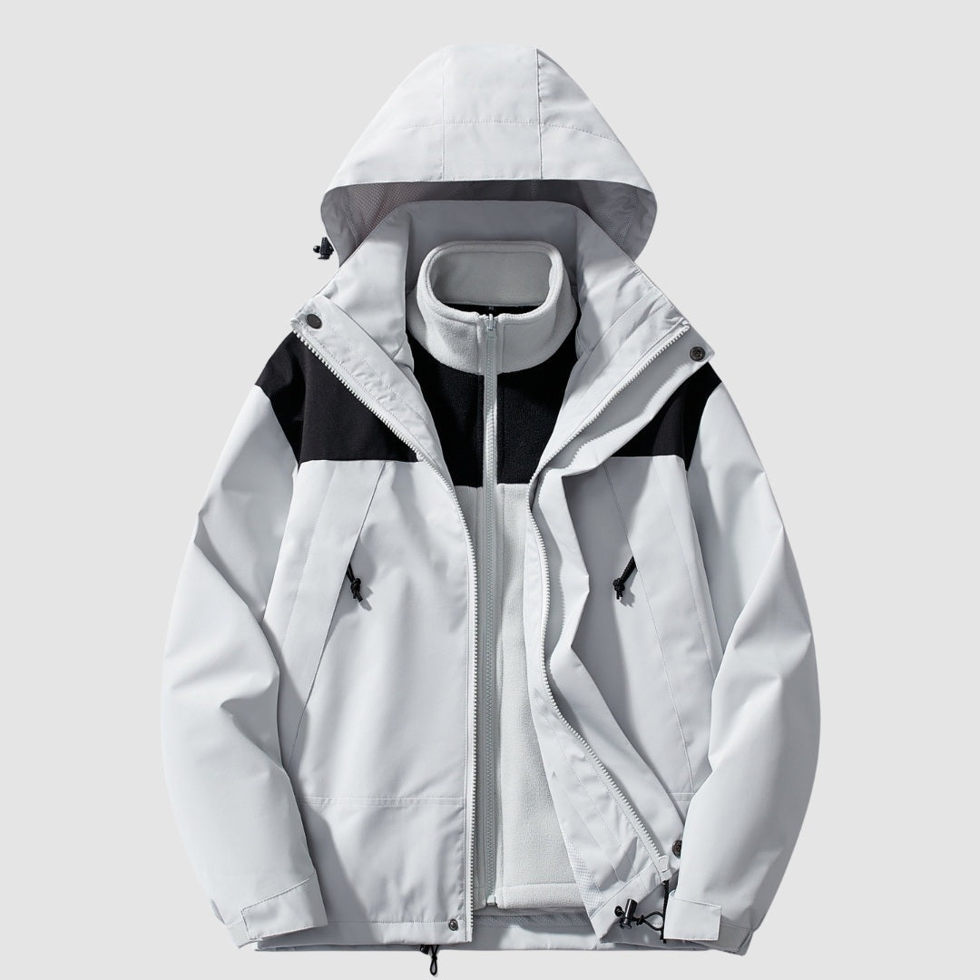 Witte 3-in-1 winterjas met capuchon, zwart kleurvlak, liggend uitgespreid getoond | Boutique Moda