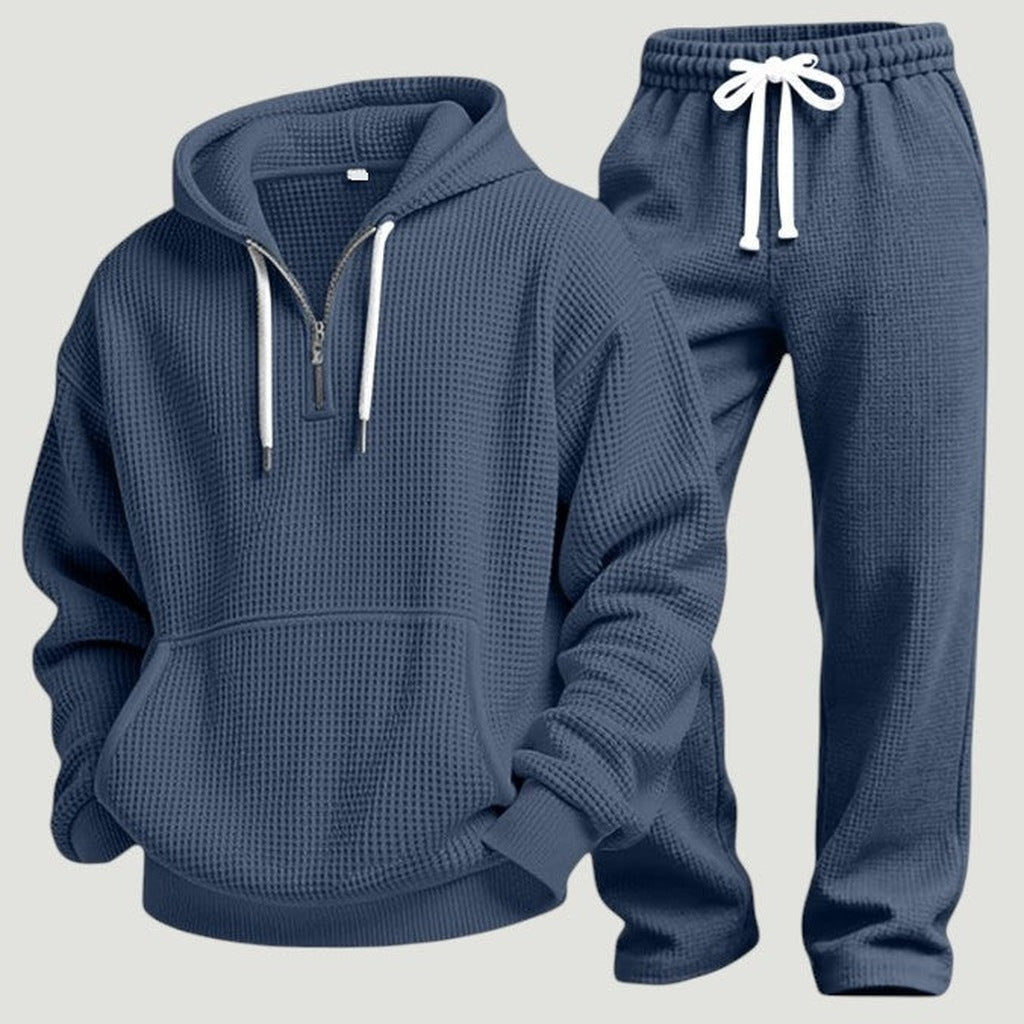 Blauw wafeltextuur trainingspak met hoodie en halve rits, los uitgestald | Boutique Moda