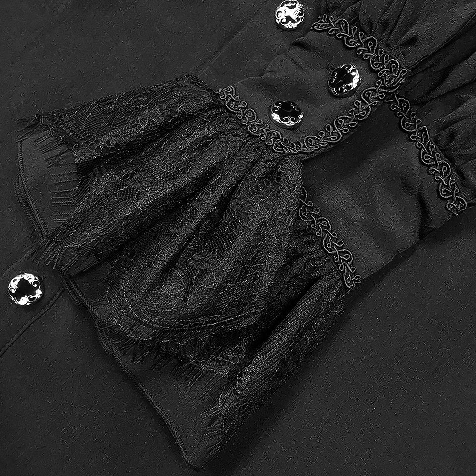 Zwarte kanten manchet met knopen en sierlijk borduursel, close-up | Boutique Moda