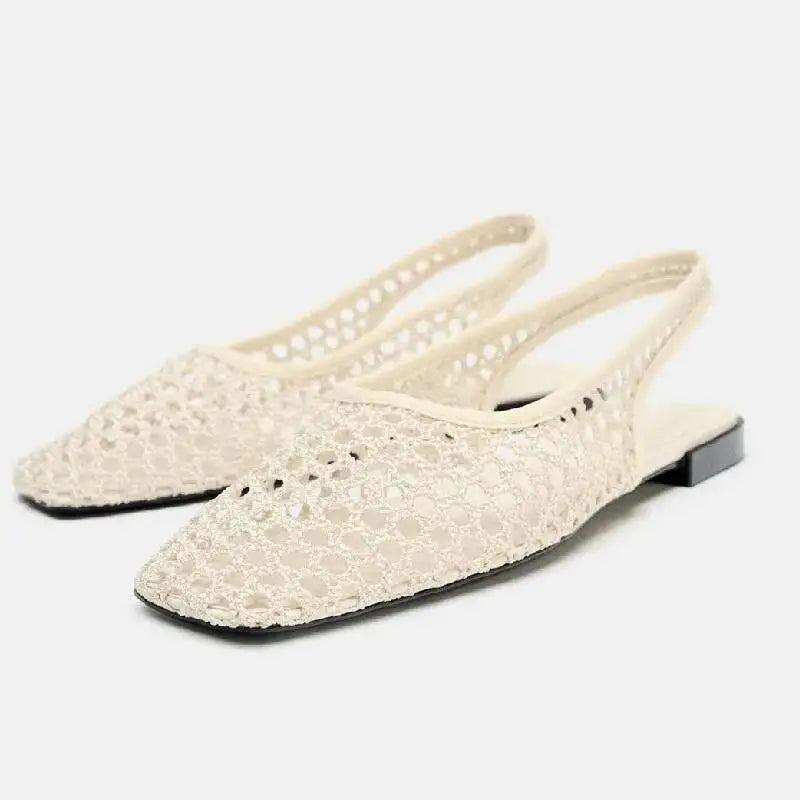 Beige opengewerkte slingback-ballerina's