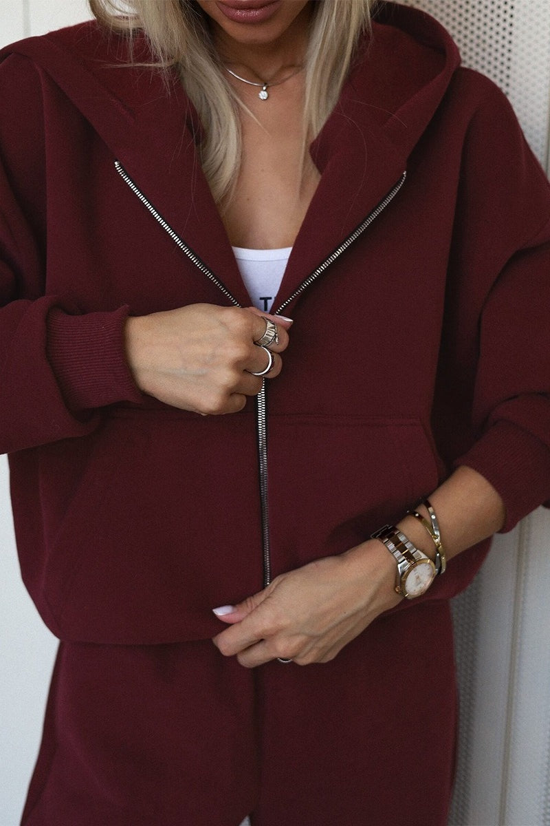 Close-up van de rits van het bordeaux vest