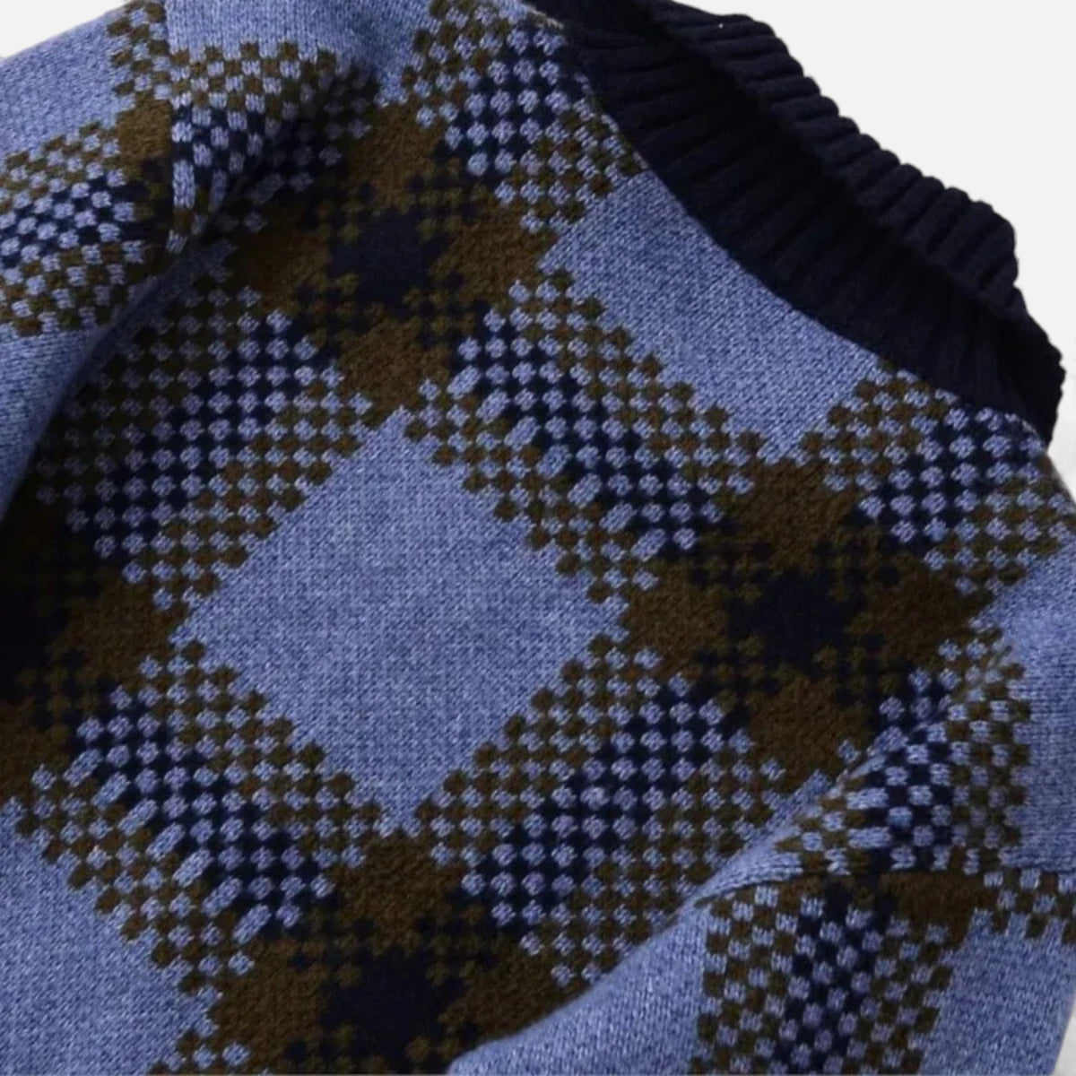 Close-up van het ruitpatroon bij de kraag
