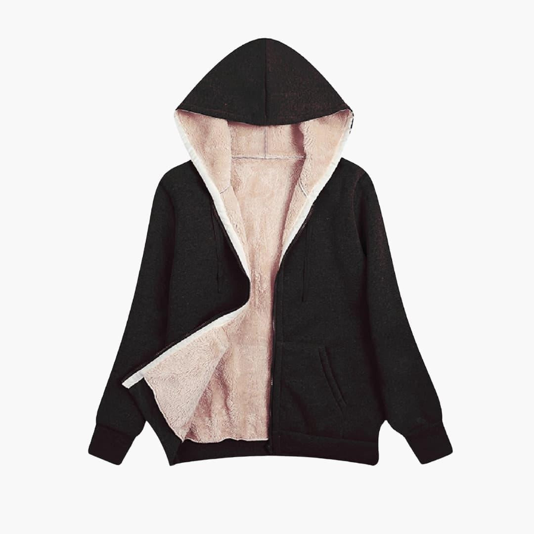Zwart sweatvest met teddyvoering, open neergelegd met zicht op de crèmekleurige voering | Boutique Moda