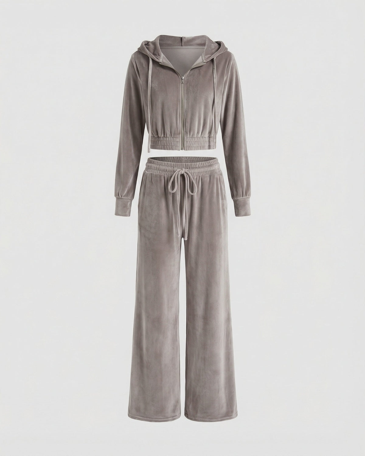 Korte hoodie met rits en wijde broek in grijs, liggend voorkant