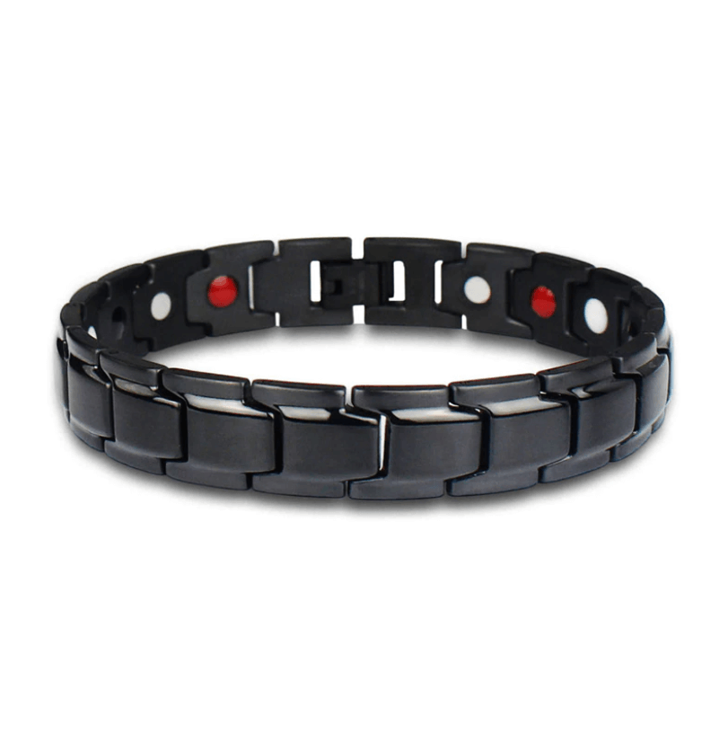 Zwart roestvrij stalen armband met magneten, plat gefotografeerd tegen witte achtergrond | Boutique Moda