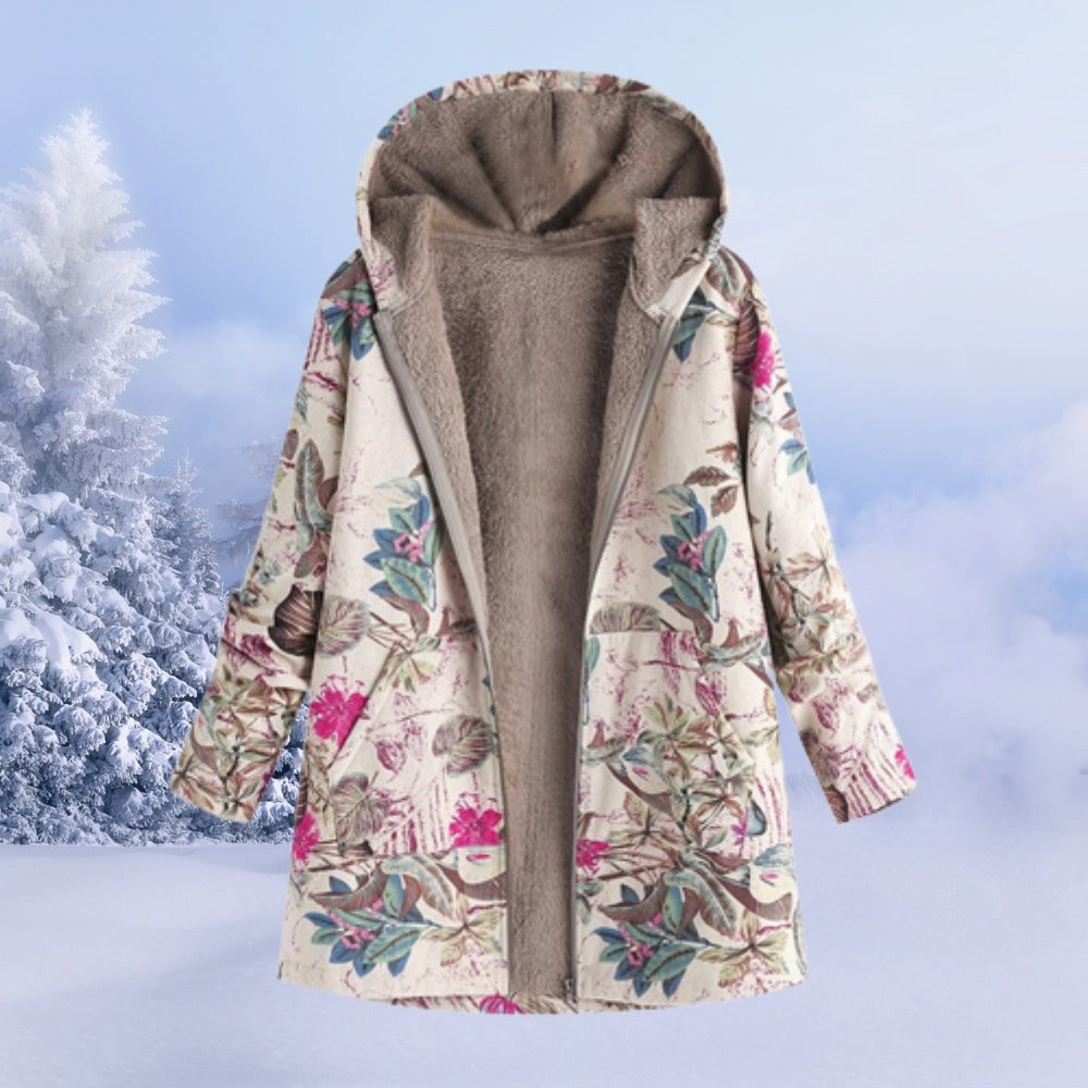Omkeerbare winterjas met capuchon in crème met roze bloemen, aan een hanger, open, met zicht op de fleecevoering