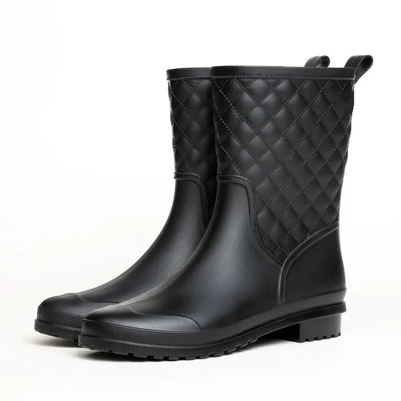 Halfhoge regenlaarzen met gewatteerde look in zwart, productfoto