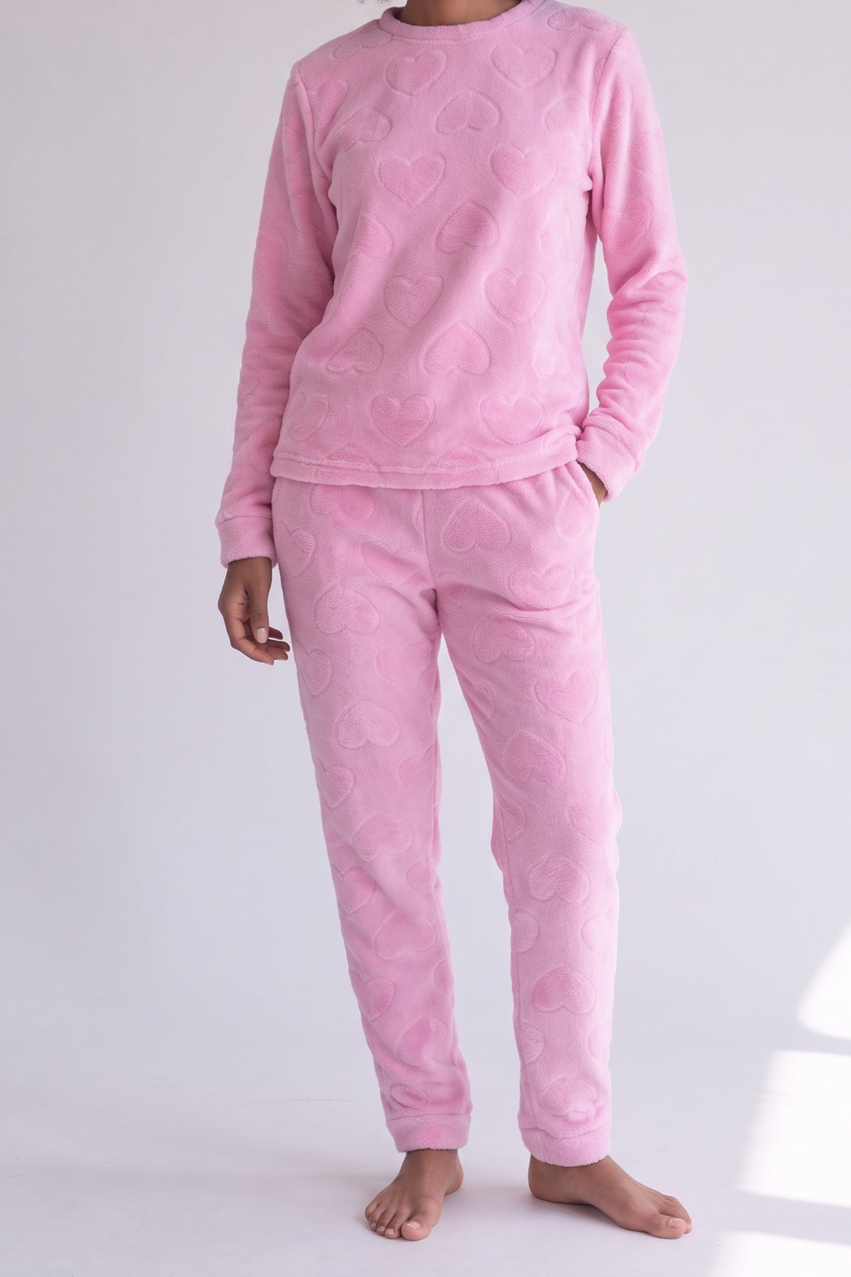 Roze teddypyjama met hartjesmotief, vooraanzicht