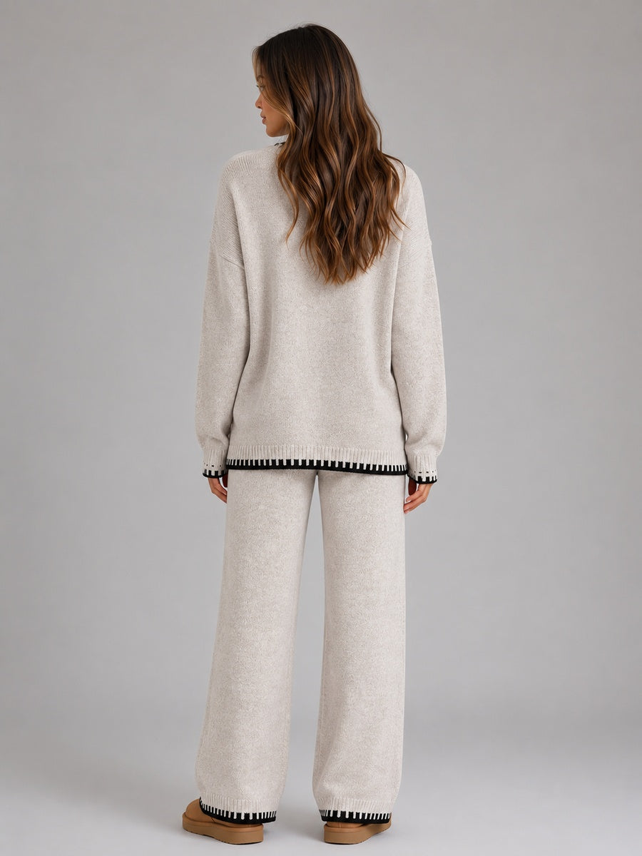 Beige gebreide trui met wijde broek, contrastzoom, gedragen door vrouw | Boutique Moda
