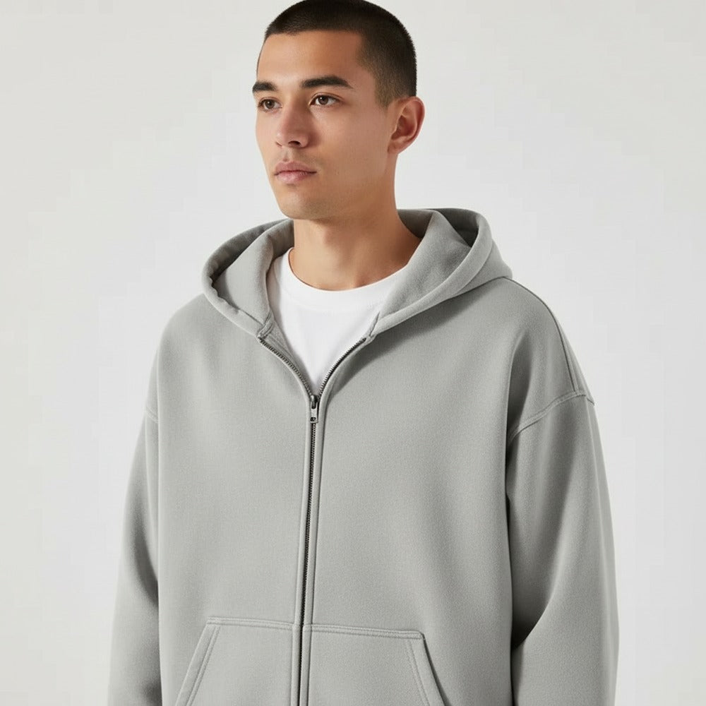 Washed hoodie met rits voor heren in grijs, gedragen, voorkant